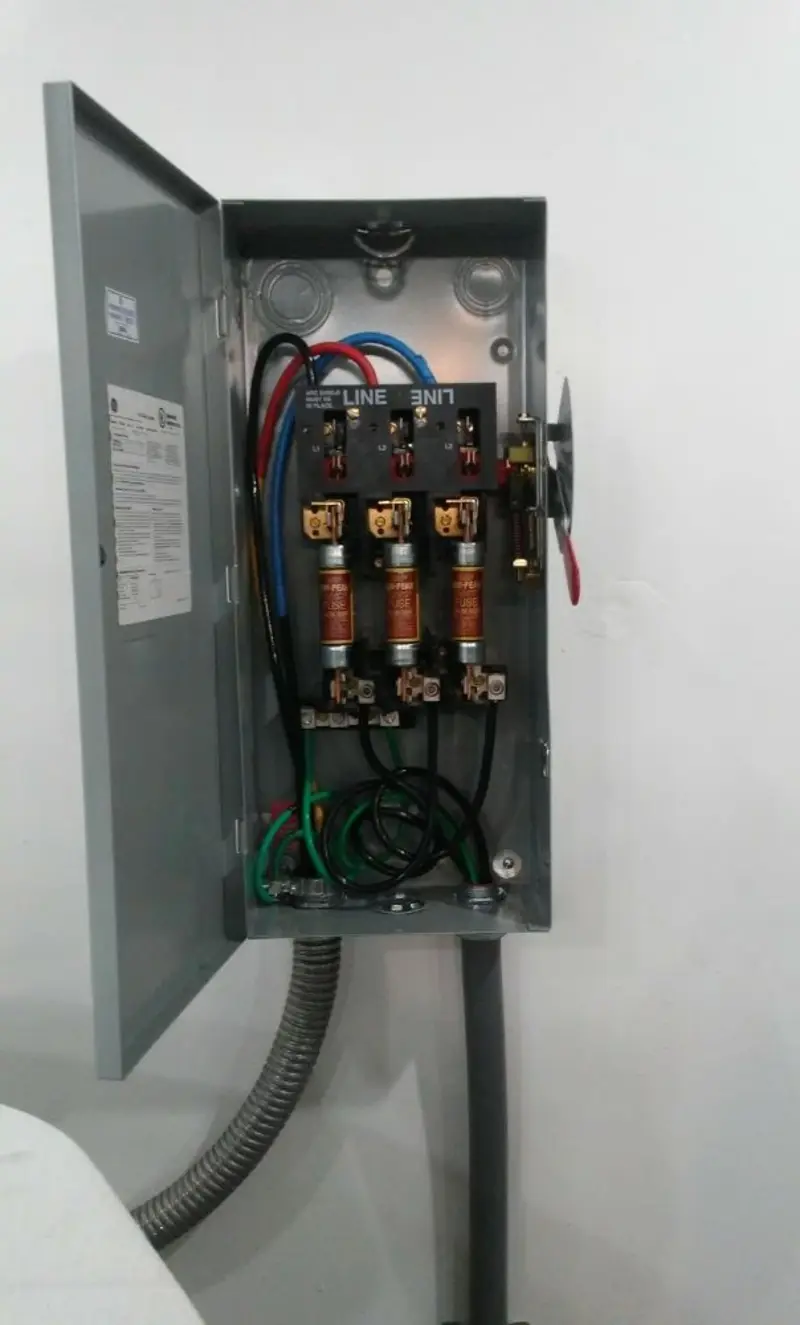 Three-phase disconnect switch installed for Smoke Detector Installation in Dickinson